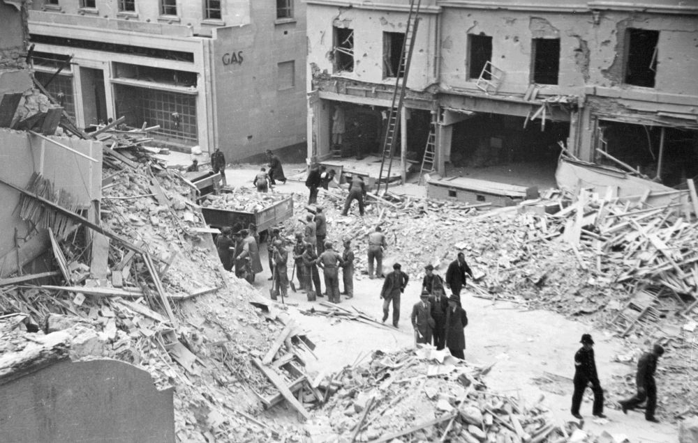 Union Street, Torquay, early June 1943. Police and rescue workers clear the debris of a raid on the 30th May.